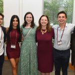 Tania Tetlow posing with a group of graduates